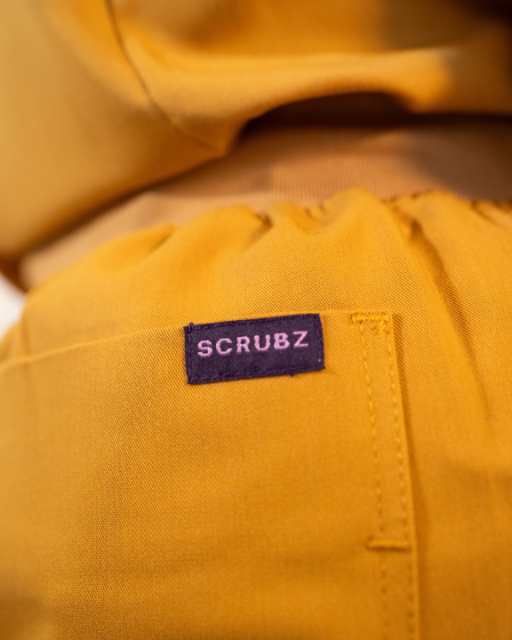 (SCRUBZ) a fresh new look into work wear CARNIVAL TOP SIZE 10-12